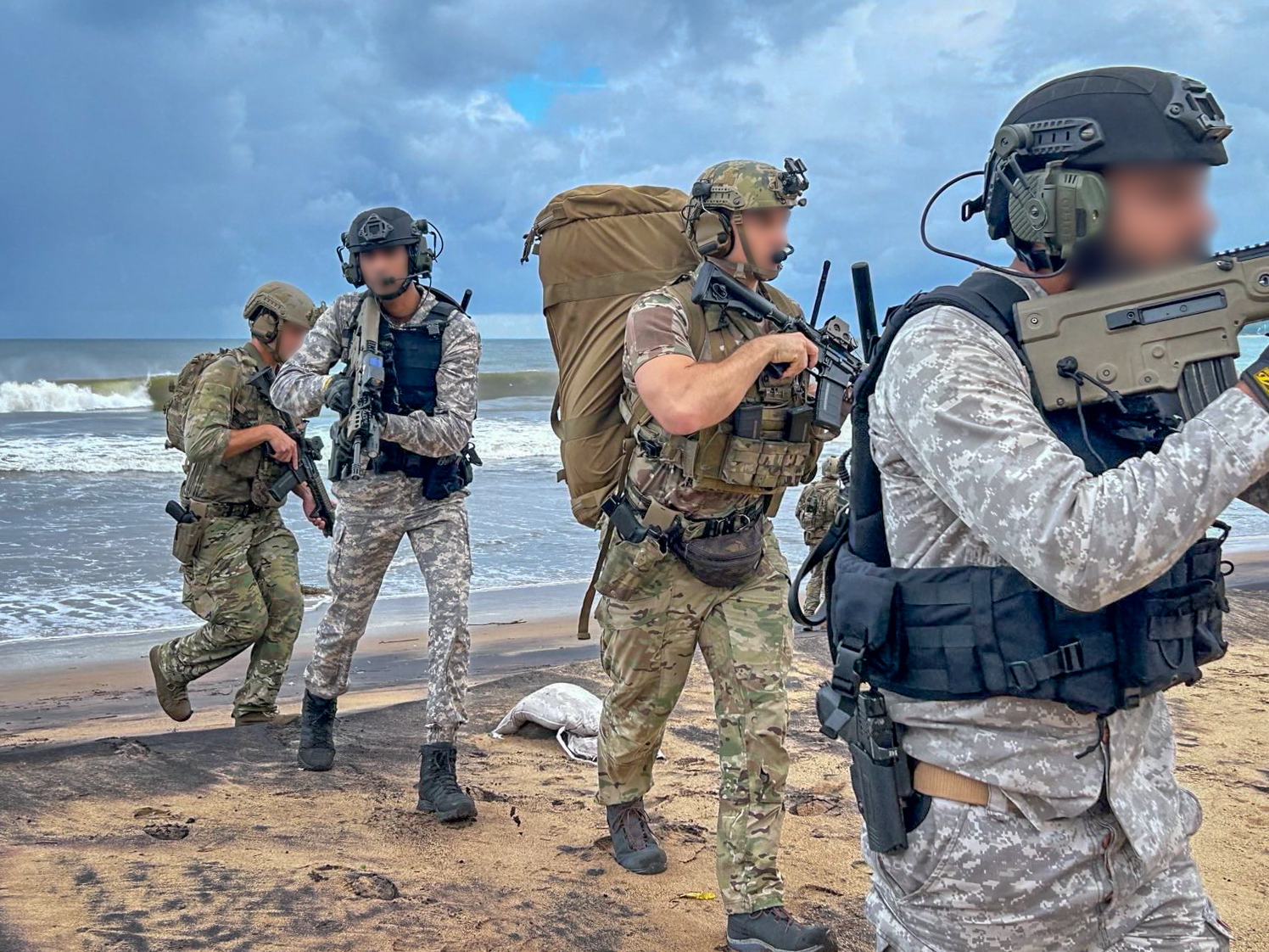 U.S. Naval Special Warfare operators and Indian Marine Commando Force members participate in close-quarters combat training in Visakhapatnam, India during exercise Malabar 2024.