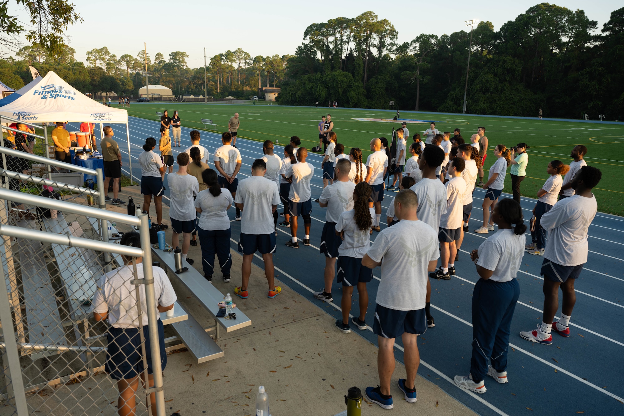 Attendees of the POW/MIA 24-hour vigil run gather to listen to opening remarks prior to the event at Hurlburt Field, Florida, Sept. 19, 2024.