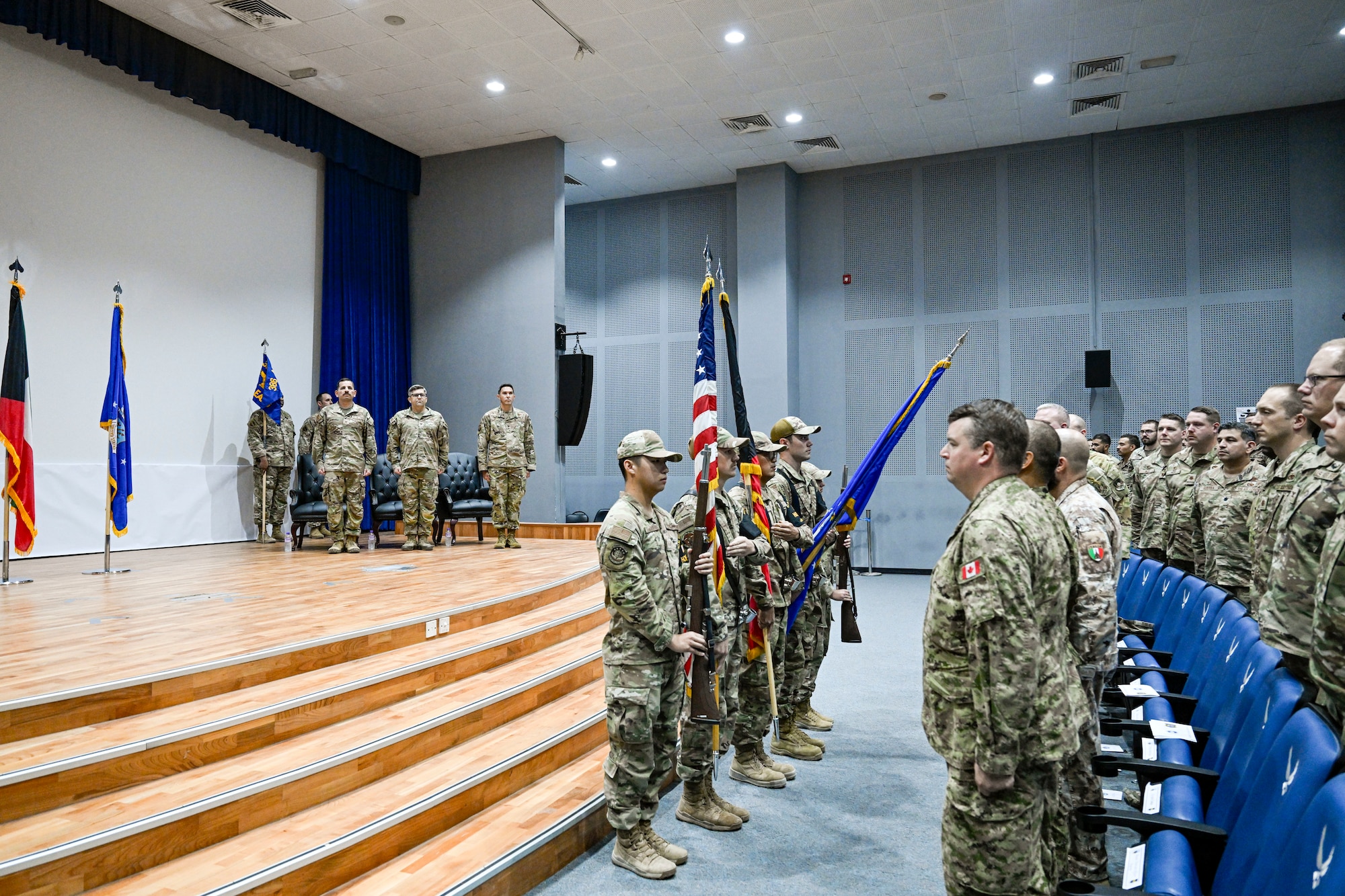 Airmen present the colors during a ceremony.