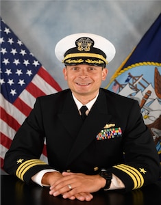 Commander Benjamin J. Mills