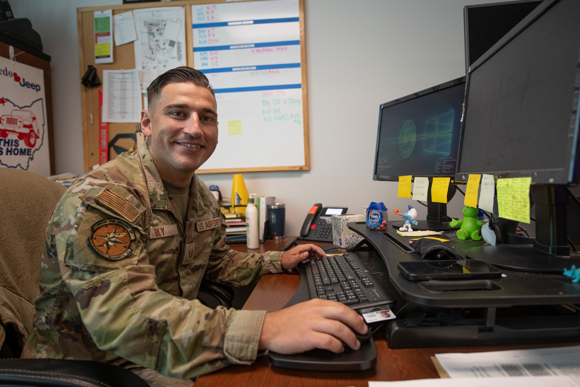 Man sits at desk