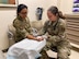 Maj. Lauren Gabreski, an allergist and immunologist with the 48th Healthcare Operations Squadron, demonstrates an allergy skin prick test at the Allergy and Immunizations Clinic at Wilford Hall Ambulatory Surgical Center, Joint Base San Antonio-Lackland, Texas, on June 25, 2024. Now stationed at Royal Air Force Lakenheath, Gabreski continues her family's long tradition of military service, striving to inspire the next generation of airmen through her leadership and dedication to military healthcare. (U.S. Air Force photo by Senior Airman Melody Bordeaux)