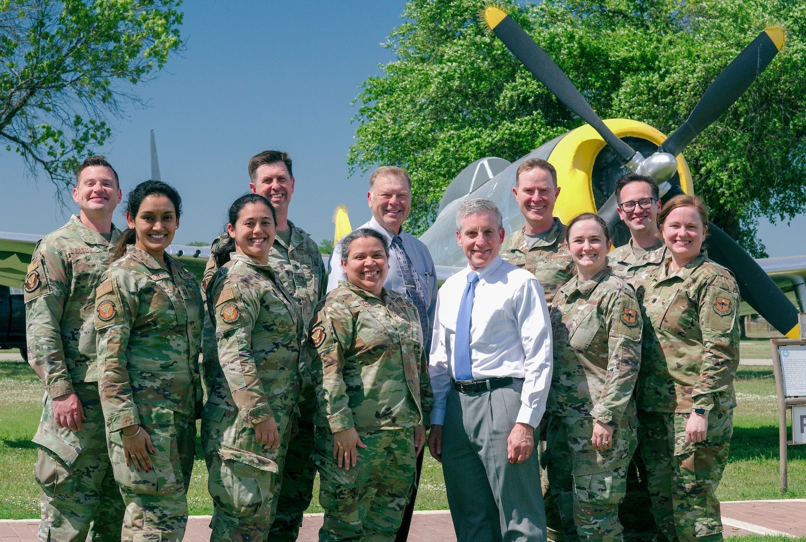 Allergy and immunology staff, along with fellows from the Allergy and Immunology Fellowship at Wilford Hall Ambulatory Surgical Center, pose for a photo at the Lackland Parade Field, Joint Base San Antonio-Lackland, Texas, in June 2024. Among them is Maj. Lauren Gabreski, whose path to becoming an Air Force allergist and immunologist began with an interest in pediatric care. After serving as a general pediatrician for four years, she participated in an Allergy Extender Program, where she discovered her passion for allergy and immunology, ultimately pursuing specialized training in the field.(U.S. Air Force courtesy photo)