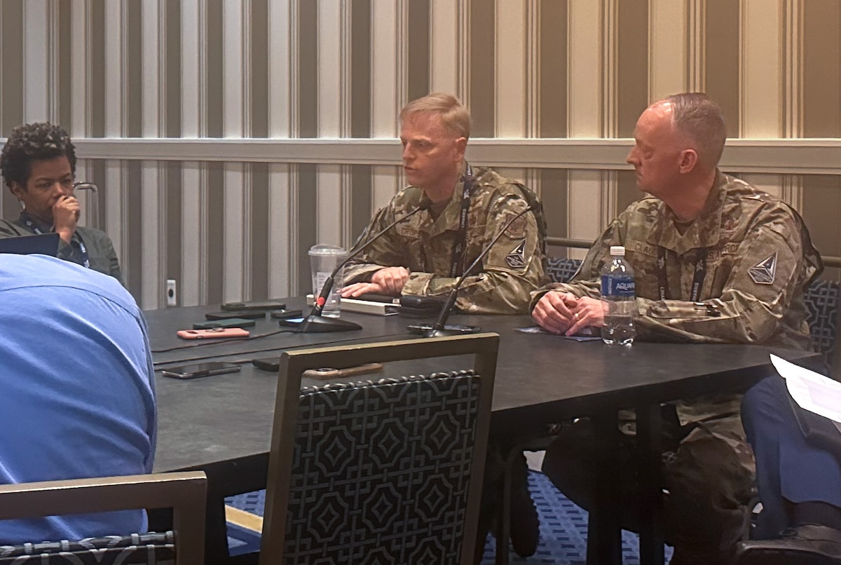 Maj. Gen. Luke Cropsey, Command, Control, Communication and Battle Management program executive officer, and Maj. Gen. Bob Claude, Chief of Space Operations mobilization assistant and Advanced Battle Management System Cross Functional Team lead, speak with reporters during Air Force Association’s Air, Space and Cyber conference Sept. 16, 2024, at National Harbor, Md. Cropsey and Claude discussed the Air Force and Space Force working together to implement operational capabilities into an integrated DAF BATTLE NETWORK.