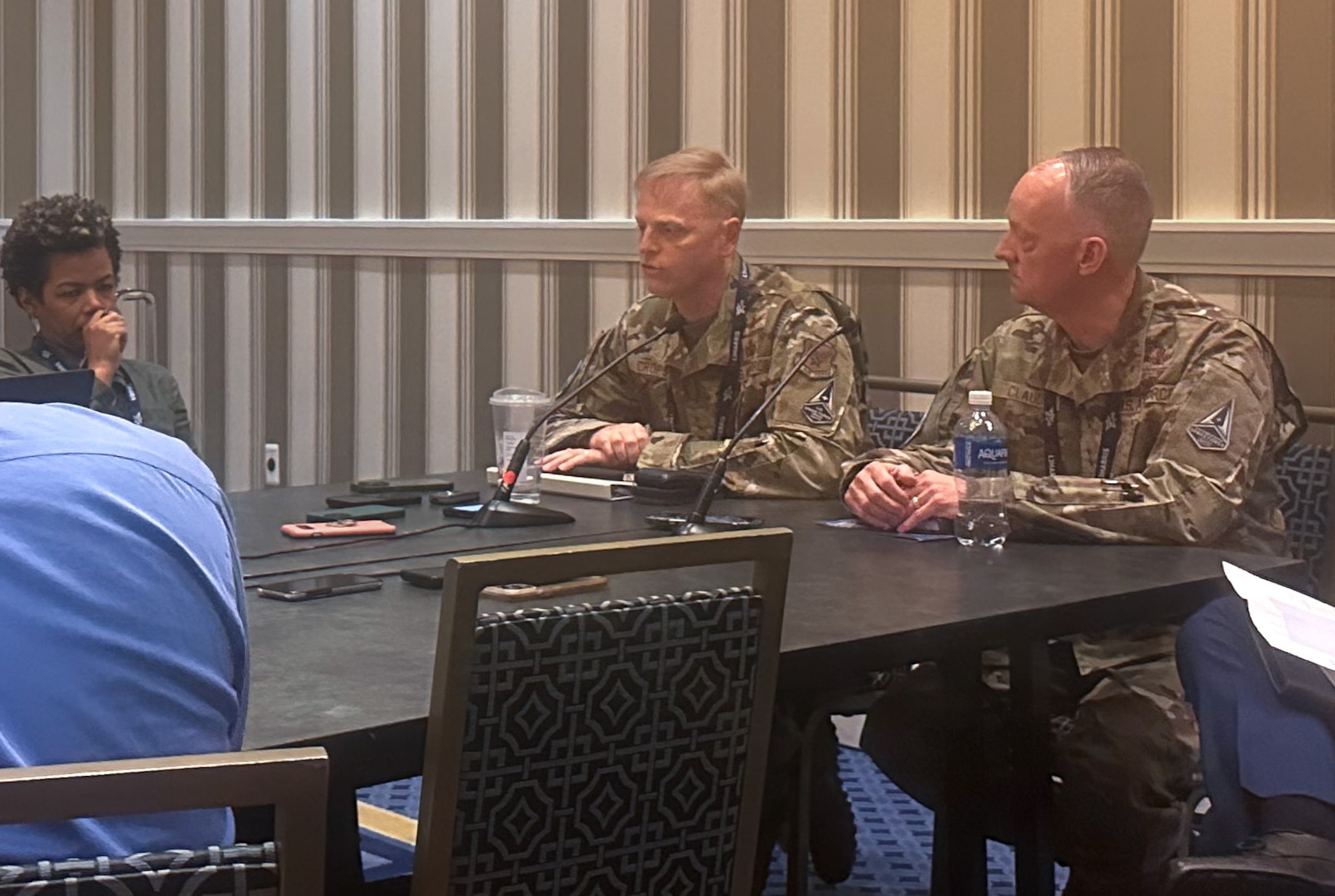 Maj. Gen. Luke Cropsey, Command, Control, Communication and Battle Management program executive officer, and Maj. Gen. Bob Claude, Chief of Space Operations mobilization assistant and Advanced Battle Management System Cross Functional Team lead, speak with reporters during Air Force Association’s Air, Space and Cyber conference Sept. 16, 2024, at National Harbor, Md. Cropsey and Claude discussed the Air Force and Space Force working together to implement operational capabilities into an integrated DAF BATTLE NETWORK.
