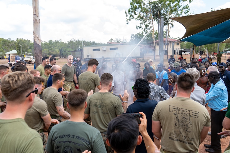 U.S. Marines, families of the fallen, and members of the Australian Defence Force participate in a smoking ceremony as part of a Pukumani ceremony hosted by the Tiwi Island-Mantiyupwi clan, in collaboration with the Larrakia Nation Aboriginal Corporation, at Melville Island, Tiwi Islands, Australia, Sept. 27, 2024. The Pukumani Ceremony is a traditional Tiwi people ritual that honors the deceased and helps guide their spirits to the afterlife, marking the official end of mourning. For the first time, U.S. Marines and family members of the fallen were honored by the Tiwi and Larrakia people during the week leading up to two culturally significant ceremonies: a healing ceremony and a Pukumani ceremony. These ceremonies commemorated the three U.S. Marines who tragically lost their lives in a U.S. Marine Corps MV-22B Osprey crash on Melville Island on Aug. 27, 2023. (U.S. Marine Corps photo by Gunnery Sgt. Kassie McDole)