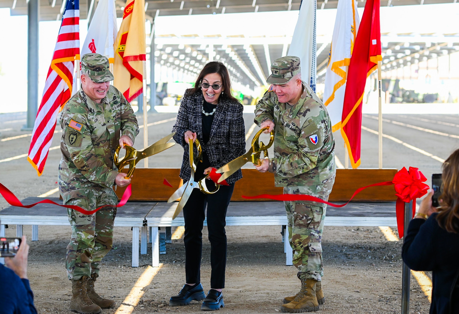 Tuesday, September 17, 2024, Fort Hunter Liggett (FHL) hosted a groundbreaking microgrid ribbon cutting ceremony. The event was narrated by FHL’s Deputy Commander Lt. Col. Amorris Conley, who introduced Garrison Commander Col. Stephen Trotter, Brig. Gen. Christopher W. Cook, Deputy Commanding General of the 63rd Readiness Division, and Col. Chad W, Caldwell of the U.S. Army Corps of Engineers, Sacramento District. Each speaker delivered remarks highlighting the significance of the ceremony and expressing gratitude to the distinguished visitors and attendees. King City Mayor Mike LeBarre presented a proclamation recognizing Fort Hunter Liggett’s achievements in advancing the microgrid project. Among the distinguished guests were Commissioner Noemi Gallardo of the California Energy Commission, Mr. Stephen Sullivan, CFO and Director for Resources, Installations and Materiel, Office of the Chief of Army Reserve, and the Honorable Rachel Jacobson, Assistant Secretary of the Army for Installations, Energy and Environment. The ceremony concluded with a ribbon cutting, a microgrid demonstration, lunch at the Warrior Restaurant, and a windshield tour of the installation. (Photo L to R: Brig. Gen. Christopher W. Cook, Deputy Commanding General of the 63rd Readiness Division, Honorable Rachel Jacobson, Assistant Secretary of the Army for Installations, Energy and Environment, Fort Hunter Liggett Garrison Commander, Col. Stephen Trotter)