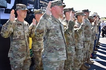 SERVICE MEMBERS CELEBRATE COMMITMENT IN JOIT REENLISTMENT CEREMONY