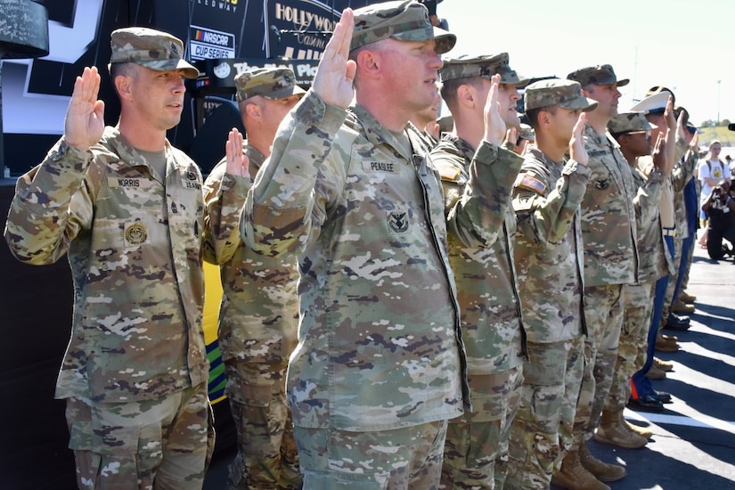 SERVICE MEMBERS CELEBRATE COMMITMENT IN JOIT REENLISTMENT CEREMONY