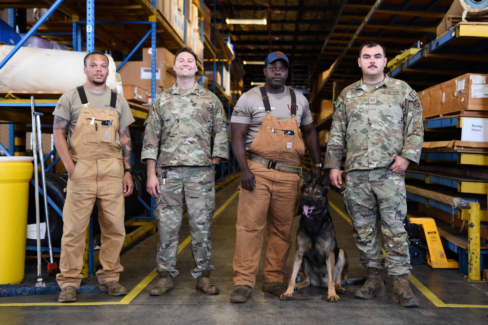 U.S. Air Force Military Working Dog handlers are pictured after completing testing of the narcotic training aid prototype at Andrews Air Force Base, Maryland, September 16, 2024. (U.S. Air Force photo by Staff Sgt. Deven Schultz)