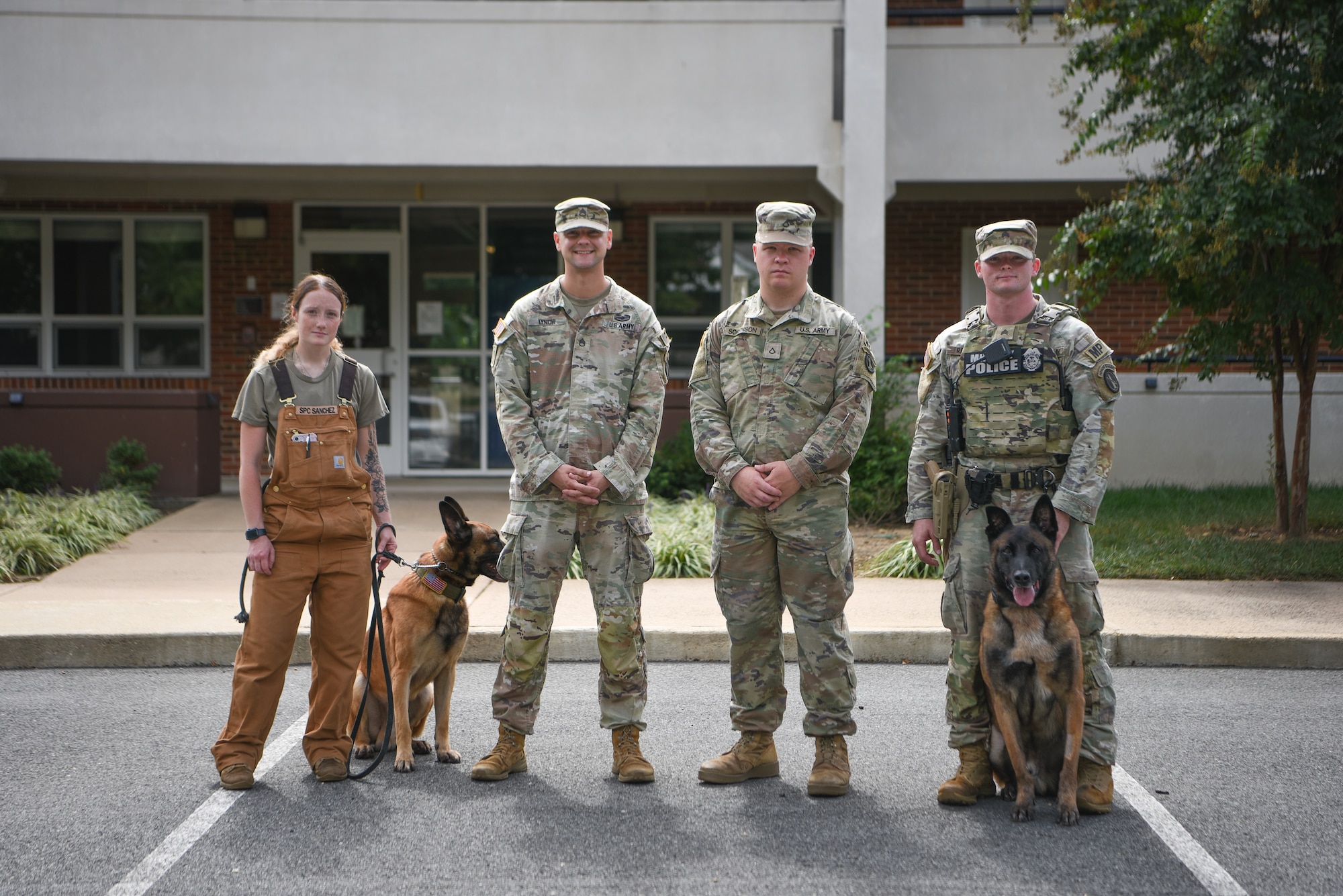 U.S. Army Military Working Dog handlers are pictured after completing testing of the narcotic training aid prototype at Fort Belvoir, Virginia, September 17, 2024. (U.S. Air Force photo by Staff Sgt. Deven Schultz)