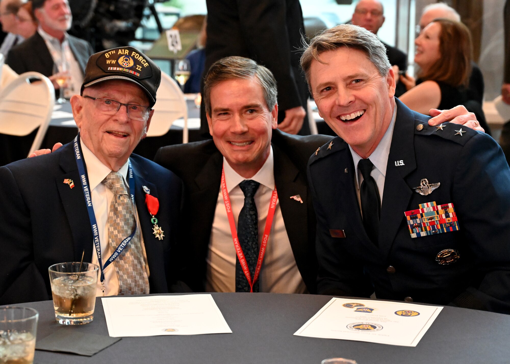 A group photo with a WII veteran and 8th Air Force commander