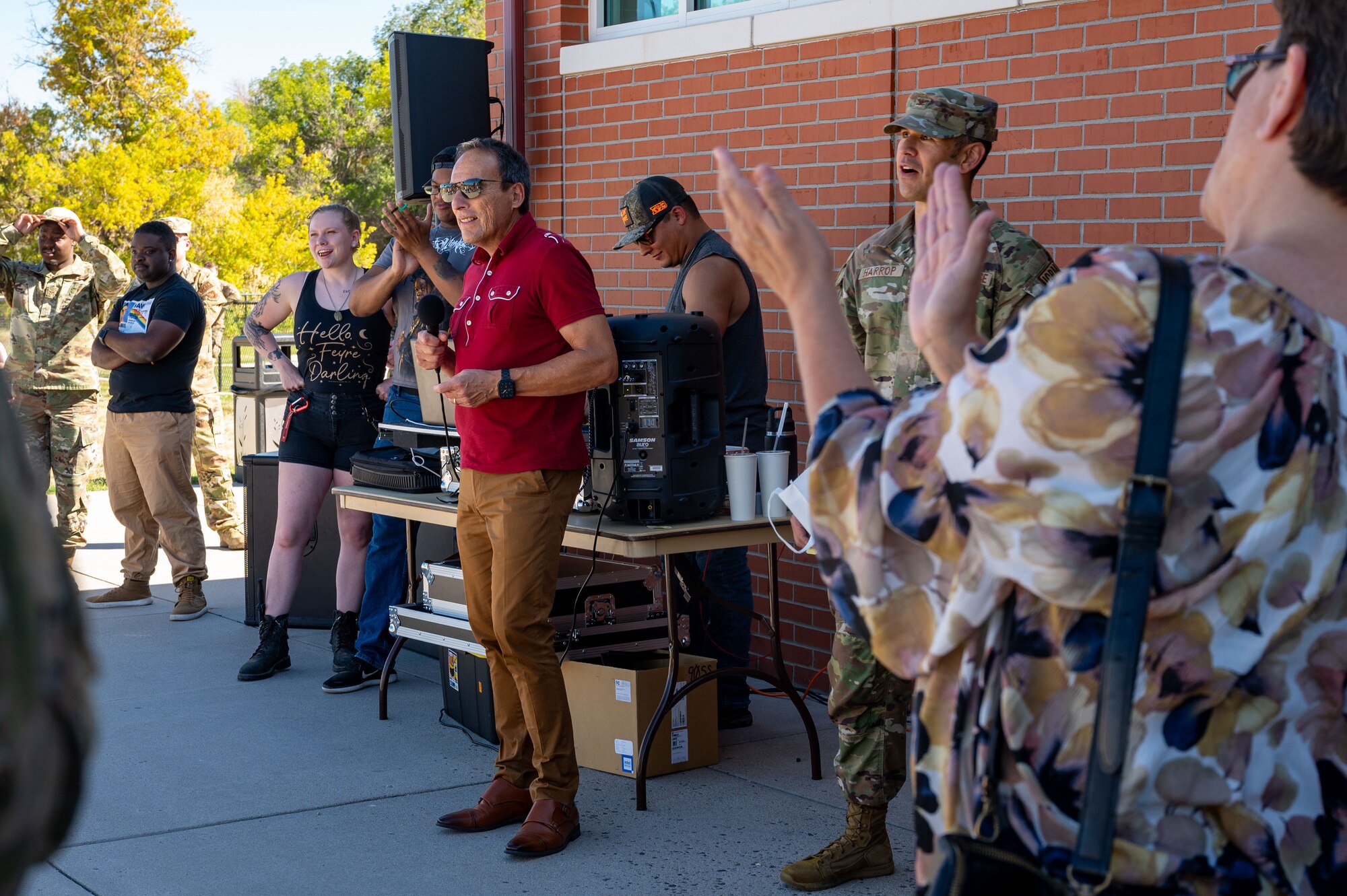 Glenn Garcia (red shirt), 90th Missile Wing Integrated Primary Prevention Workforce Prevention and Response director, announces the winners of the 90 MW Resiliency Day raffle at F.E. Warren Air Force Base, Wyoming, Sept. 25, 2024. The 90 MW’s Prevention and Resiliency Day emphasized offering resources aimed at strengthening the well-being, resilience, and readiness of Airmen and their families. (U.S. Air Force photo by Senior Airman Landon Gunsauls)