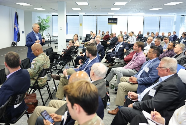 Mr. Cordell DeLaPena, program executive officer for Military Communications & Positioning, Navigation and Timing at Space Systems Command, addresses participants at the MILSATCOM Reverse Industry Day in Chantilly, VA on September 4, 2024