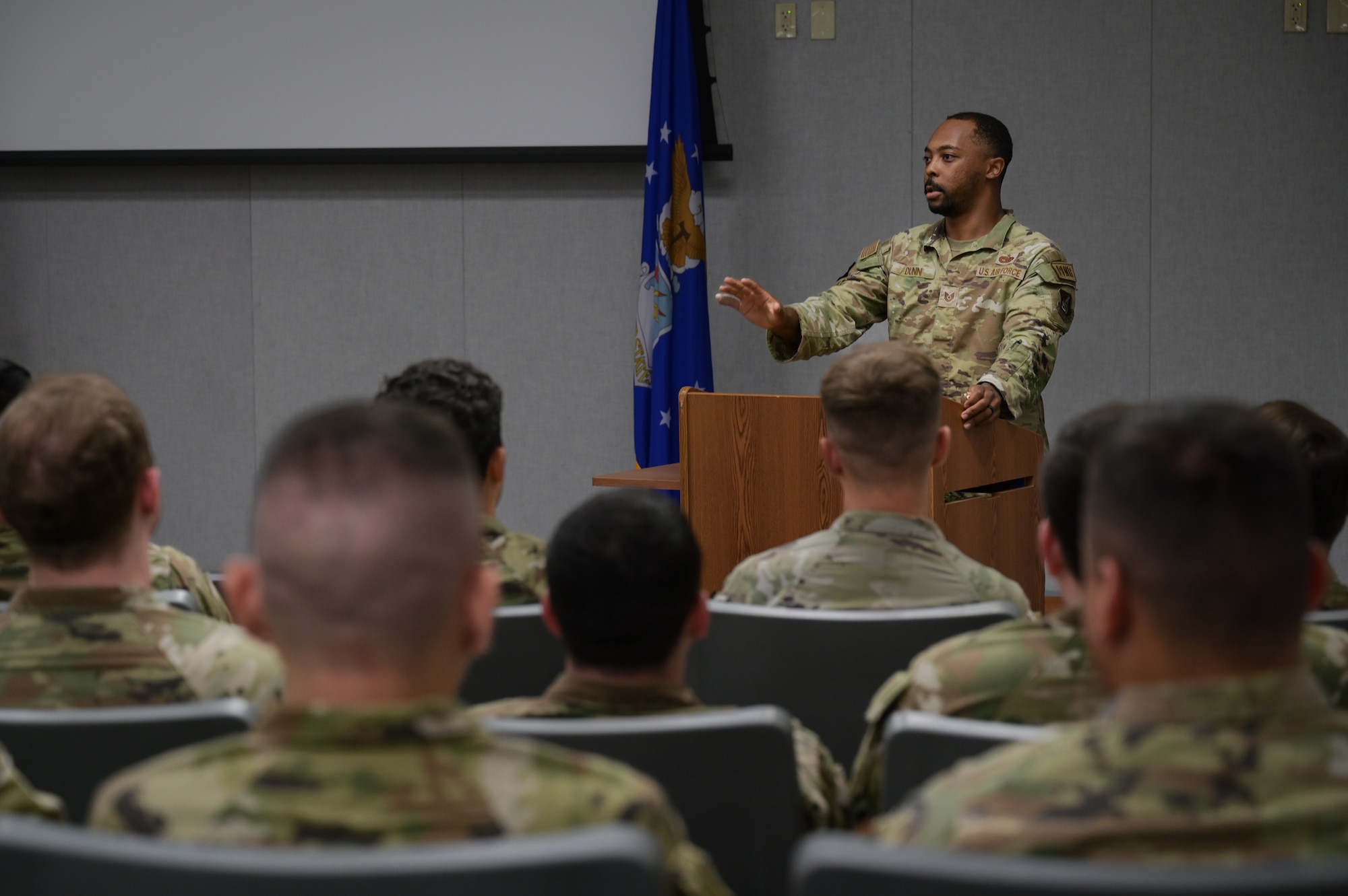 Airmen gives pre-deployment brief during an exercise.