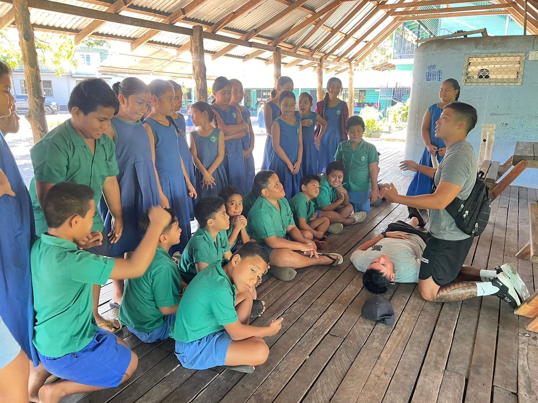 U.S. Coast Guard Cutter Oliver Berry (WPC 1124) crew members conduct a first aid and CPR demonstration, showing basic life-saving techniques with students from a local school in Western Samoa, Sep. 17, 2024. U.S. Coast Guard Cutter Oliver Berry’s crew recently completed a 45-day patrol in Oceania in support of Operation Blue Pacific, promoting security, safety, sovereignty, and economic prosperity in the region.