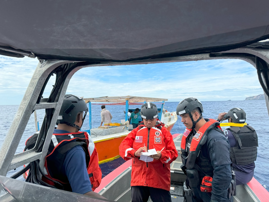 U.S Coast Guard Petty Officer 3rd Class Roberto Jimenez (right), a U.S. Coast Guard Cutter Oliver Berry (WPC 1124) maritime law enforcement specialist, conducts a boarding with members of the Fjii Ministry of Fisheries, Revenue and Customs Service and Navy in the archipelagic waters of Fiji, Sept. 6, 2024. U.S. Coast Guard Cutter Oliver Berry’s crew recently completed a 45-day patrol in Oceania in support of Operation Blue Pacific, promoting security, safety, sovereignty, and economic prosperity in the region.