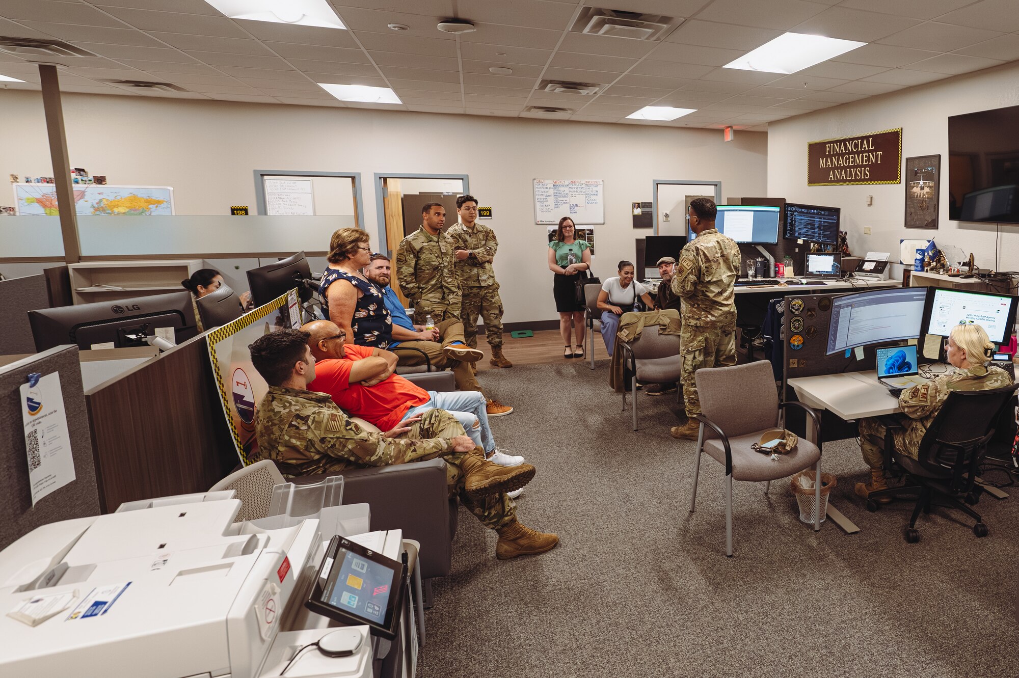 Members of the 325th Comptroller Squadron conduct a meeting