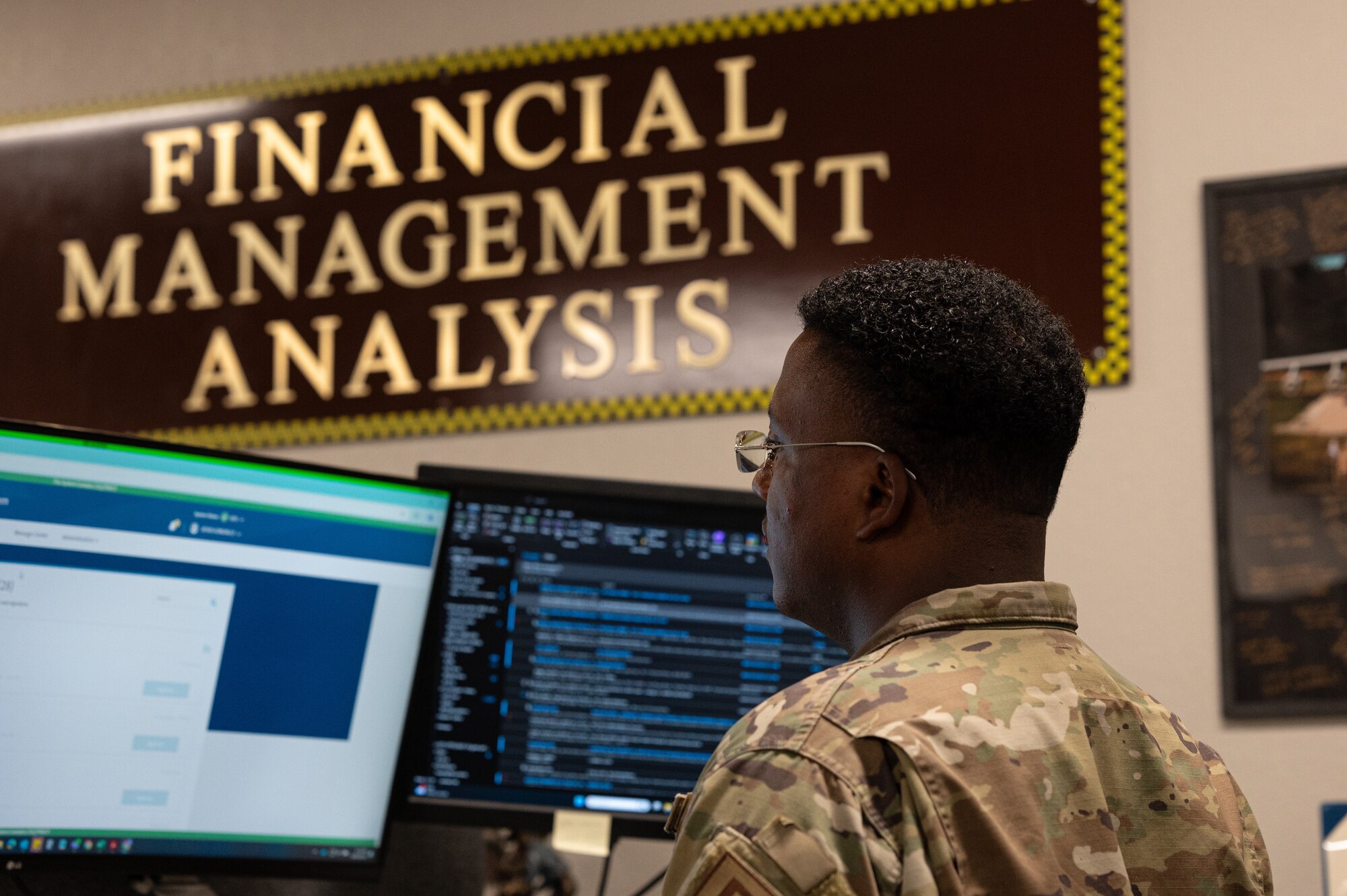 airman works on computer