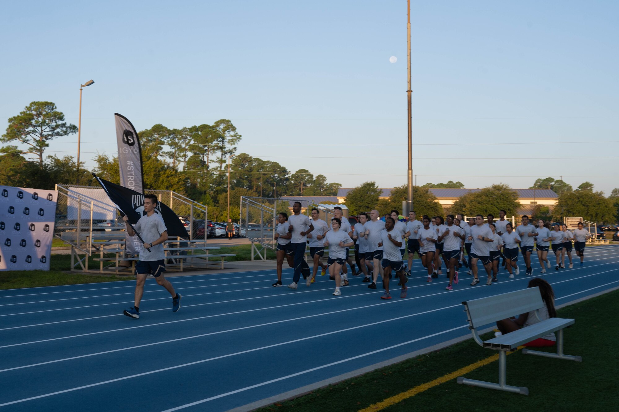 U.S. Airmen assigned to the 1st Special Operations Force Support Squadron participate in the POW/MIA 24-hour vigil run at Hurlburt Field, Florida, Sept. 19, 2024.