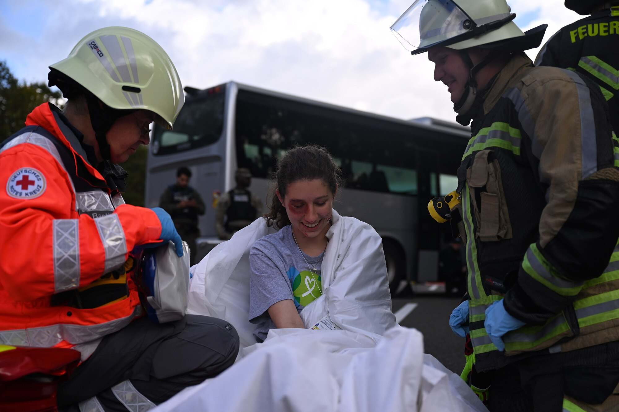 German first responders care for a simulated patient during a joint German-American Disaster Response Exercise