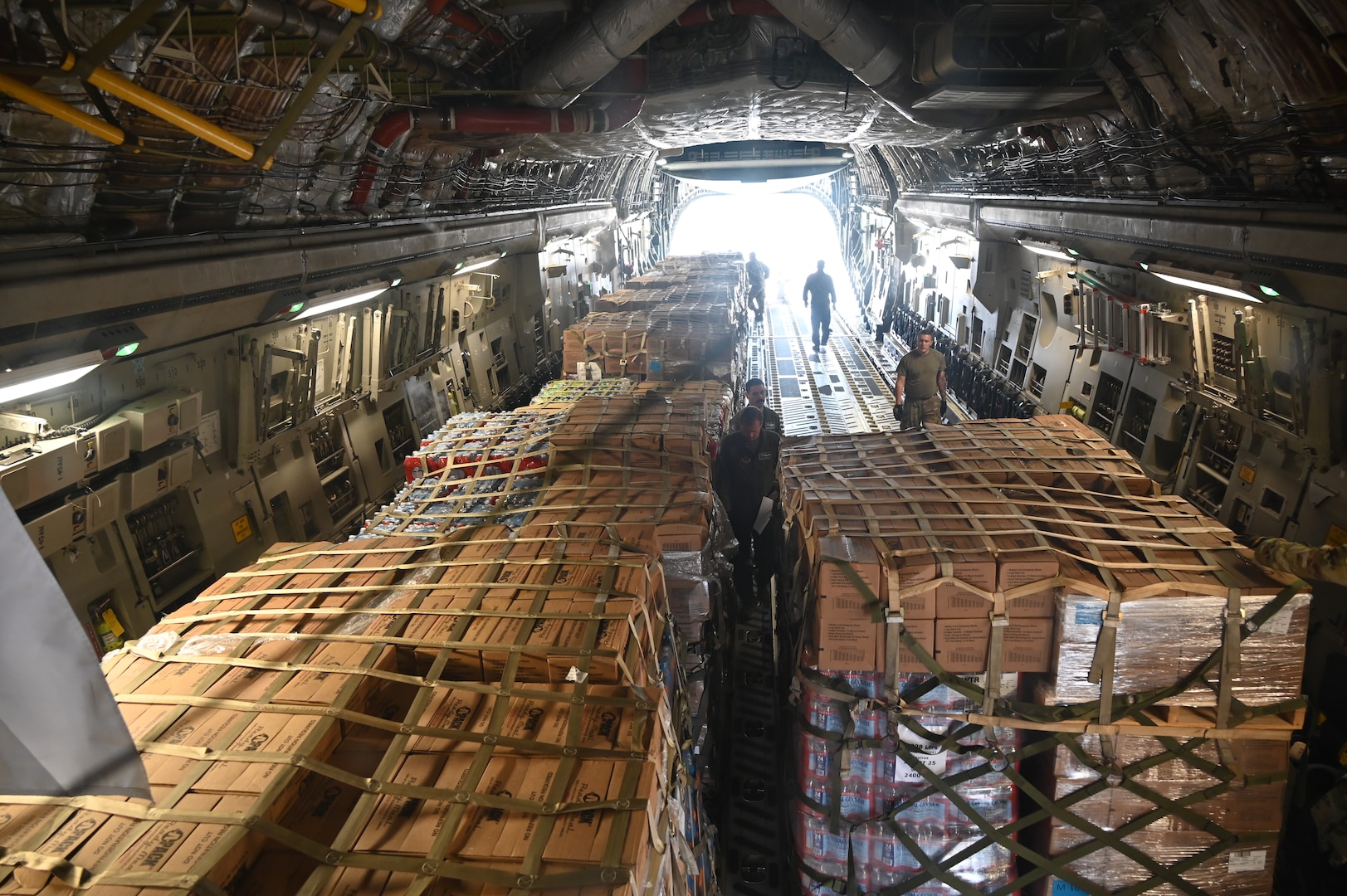 Members of the North Carolina Air National Guard transport more than 100,000 pounds of essential goods to Western North Carolina to support humanitarian efforts following Hurricane Helene. The cargo, delivered to Asheville aboard a C-17 Globemaster III, consisted of more than 48 pallets of water, Meals Ready to Eat and other vital supplies.