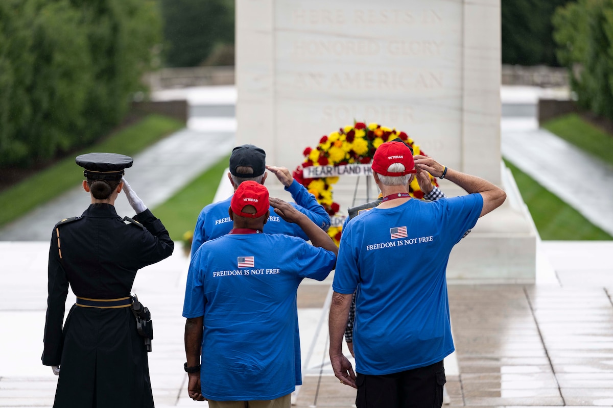 Veterans of a “Dustoff” medevac crew participate in a wreath-laying ceremony at the Tomb of the Unknown Soldier at Arlington National Cemetery, Va., Sept. 25, 2024. Dustoff crews conducted rapid medical evacuations under perilous conditions during the Vietnam War.