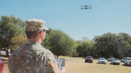 Sgt. Donald Underwood, an unmanned aerial systems operator with Delta Company, 545th Brigade Engineer Battalion, 45th Infantry Brigade Combat Team, Oklahoma Army National Guard, operates a UAS during a multi-agency wildland firefighting unmanned aerial systems integration exercise at Crowder Lake near Weatherford, Oklahoma, Sept. 25-26, 2024. The exercise brought the Oklahoma National Guard, state and local agencies and several private UAS companies together to develop a common operating picture.