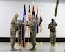 The command team of the 1108th Theater Aviation Sustainment Maintenance Group prepare to case their home unit colors to mark the official end of their tour in theater during a transfer of authority ceremony in the U.S. Central Command area of responsibility, Aug. 14, 2024.  (U.S. Army photo by Sgt. 1st Class Gecyca Martin)