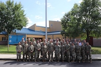 Members from the Maryland National Guard and the Armed Forces of Bosnia and Herzegovina pose for a group photograph outside the Pvt. Henry Costin Readiness Center in Laurel, Maryland, Sept. 19, 2024. AFBiH members from the Cyber Operations Center spent a week in Maryland conducting a military-to-military exchange with the CPT 169 to enhance their capabilities through a collaborative learning environment.