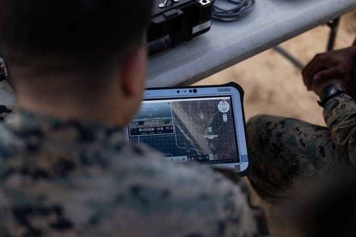 Marine Corps Lance Cpl. Dominic Albanese, a drone operator with I MEF Information Group, operates the R80D Sky Raider during exercise Cobra Horizon 24.2 at Camp Pendleton, California, Sept. 25, 2024. The exercise focuses on refining expeditionary meteorology and oceanographic employment, rapid response planning processes, and integrating a multi-service METOC environment to support future missions.