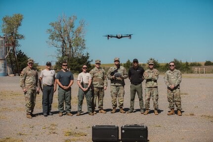 Members of the Oklahoma National Guard stand with local partners during a multi-agency wildland firefighting unmanned aerial systems integration exercise at Crowder Lake near Weatherford, Oklahoma, Sept. 25-26. The exercise brought the Oklahoma National Guard, state and local agencies and several private UAS organizations together to develop a common operating picture, ensuring all public safety teams have a shared view of a multi-agency response to events like wildland firefighting. (Oklahoma National Guard photo by Sgt. Haden Tolbert)