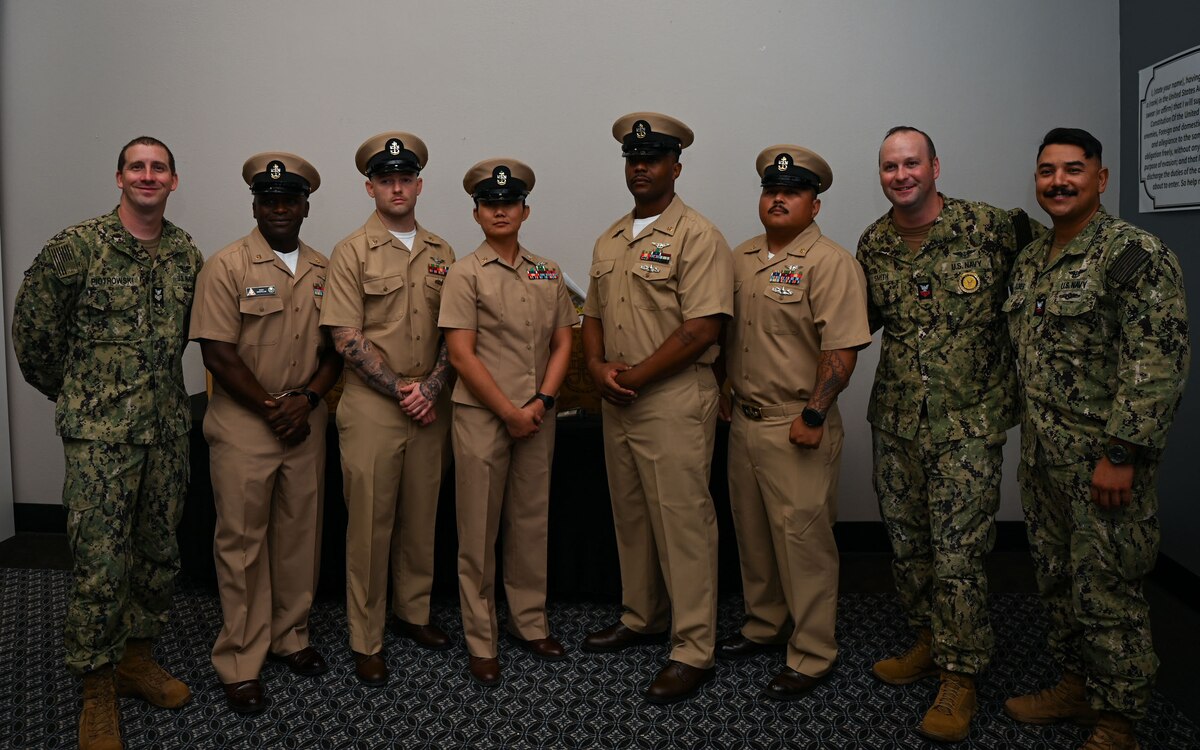 U.S. Navy Aviation Boatswain's Mate Aircraft Handlers assigned to the Navy Air Technical Training Center Pensacola Learning Site Goodfellow attend the Fiscal Year 2025 Chief Petty Officer Pinning Ceremony at the Powell Event Center, Goodfellow Air Force Base, Texas, Sept. 27, 2024. ABHs serve a significant role in launching and recovering naval aircraft quickly and safely from land or ships. This includes aircraft handling, fire fighting and salvage and rescue operations. (U.S. Air Force photo by Airman 1st Class Evelyn J. D’Errico)