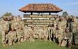 Soldiers assigned to the 472nd Chemical Biological Radiological and Nuclear (CBRN) Battalion, 76th Operational Response Command pose for a photograph outside of the Joint Multinational Simulation Center during exercise Avenger Triad 24 September 19, 2024, in Grafenwoehr, Germany. Avenger Triad is a command post exercise led by U.S. Army Europe and Africa where organizations test and enhance their ability to synchronize U.S. and NATO warfighting across Europe. (U.S. Army Reserve photo by Lt. Col. Joshua Frye)