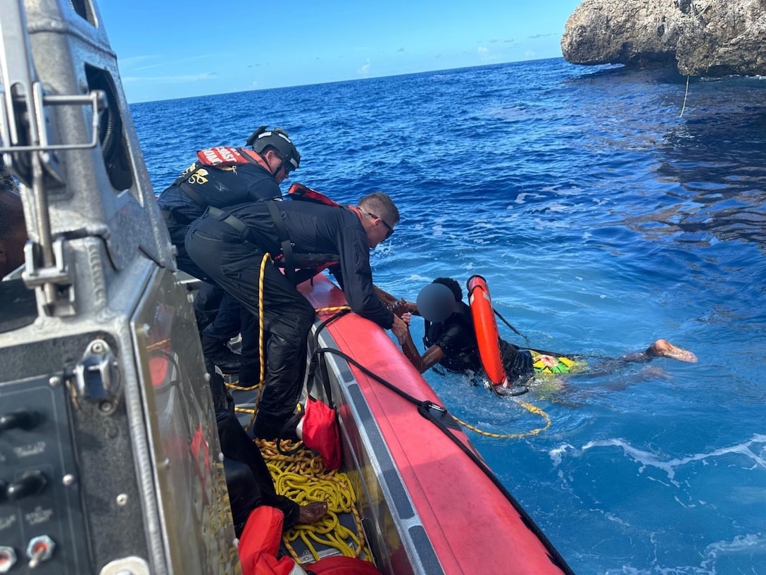 The crew of Coast Guard Cutter Joseph Tezanos rescues 14 migrants, Sept. 29, 2024, who were left stranded by smugglers on the uninhabited natural reserve of Monito Island, Puerto Rico, in the Mona Passage. The rescue involved efforts and coordination with Caribbean Border Interagency Group (CBIG) partner agencies and Puerto Rico Department of Natural and Environmental Resources Park Rangers.  The migrant group was transferred to U.S. Boder Patrol Agents in Mayaguez, Puerto Rico, where EMS authorities provided assistance. (U.S. Coast Guard photo)