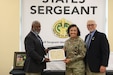 Sgt. Maj. Melissa Solomon, 84th Training Command G3/5/7 Sgt. Maj., receives her induction into the U.S. Army Drill Sergeant Hall of Fame during the induction ceremony on September 19, 2024.