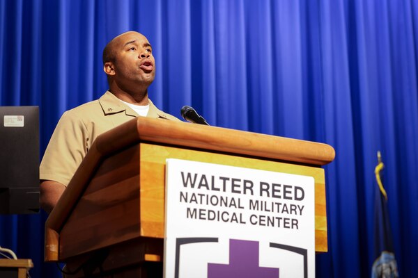 Hospital Corpsman Chief Petty Officer Jarrad Howse performs the national anthem for the Chiefs Pinning Ceremony for NCR Navy Medicine in Memorial Hall at Walter Reed National Military Medical Center September 27, 2024. 16 Servicemembers received anchors at the ceremony. (DOD Photo by Christian Lilakos)