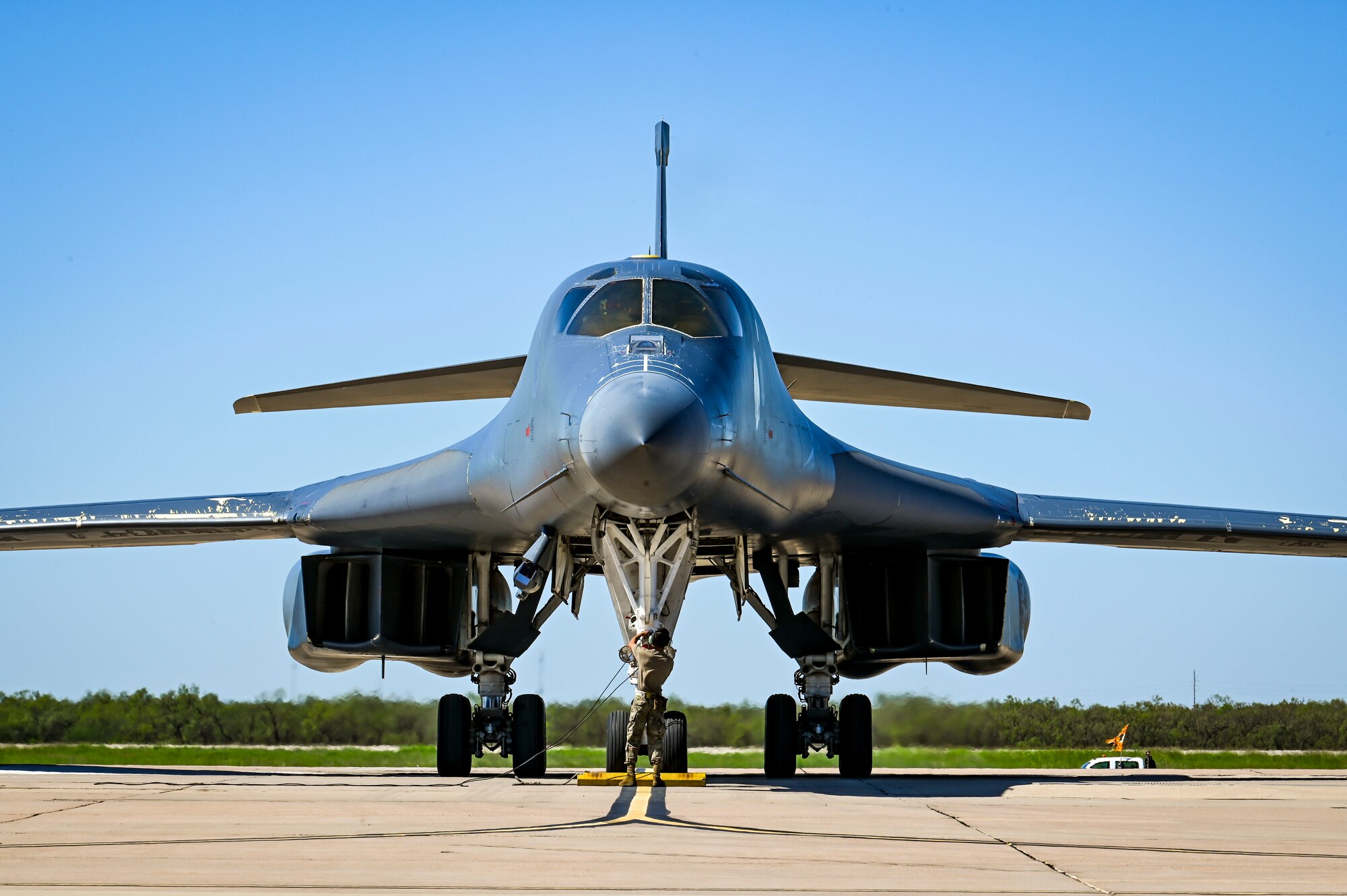 A B-1B Lancer parks on the ramp at Dyess Air Force Base, Texas, after returning from a CONUS to CONUS Bomber Task Force mission in support of U.S. Indo-Pacific Command Oct. 1, 2024. Bomber missions support national security objectives through the speed, flexibility, and readiness of our strategic bombers. (U.S. Air Force photo by Staff Sgt. Matthew Angulo)