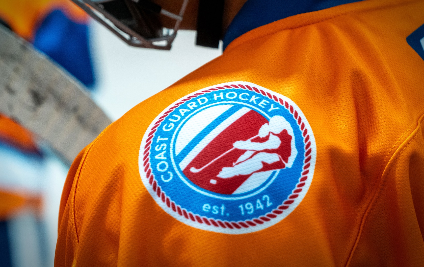 A Coast Guard Hockey team member wears the Mid-Atlantic team jersey in the 2024 Tunnels to Towers Heroes Cup on Sept. 14, 2024, in Morristown, New Jersey. The Coast Guard Hockey team claimed victory in the 2024 Tunnels to Towers Heroes Cup representing Coast Guard active duty, reserves, and veterans while raising funds for the Tunnel to Towers Foundation. (Coast Guard photo by Petty Officer 2nd Class Sydney Phoenix)