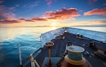 The Coast Guard Cutter Munro sails during unusually calm waters on the Bering Sea.