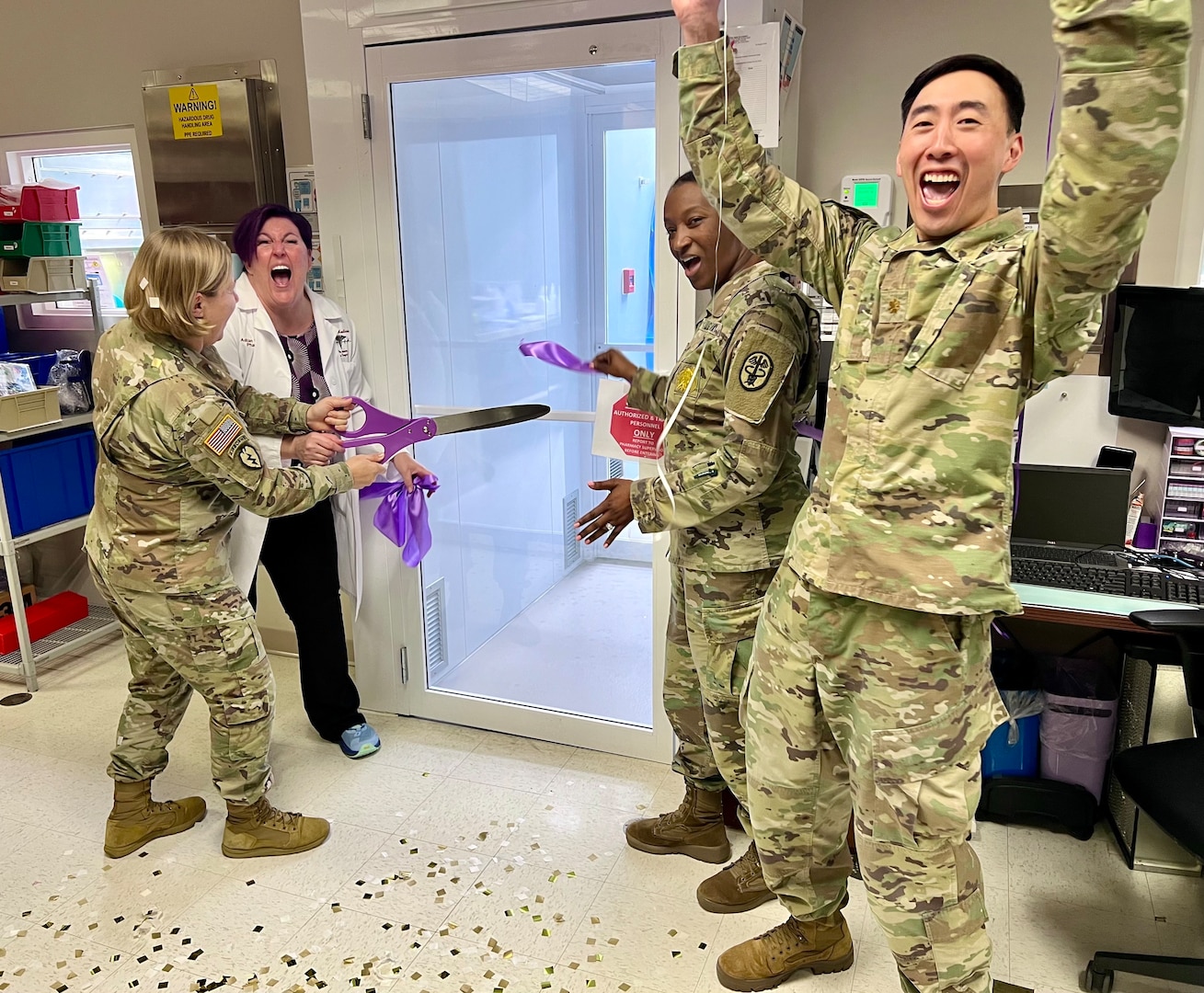 Winn Army Community Hospital director and commander Col. Margaret Berryman and inpatient pharmacist Adrian Bell cut the ribbon Oct. 2 on the new clean room while Col. Felisia Hibbler, deputy commander of nursing, and Maj. Jason Cha, pharmacy chief, celebrate.

A project eight years in the making, the hospital’s inpatient pharmacy clean room ensures the safe preparation of sterile medicines, including intravenous drugs, for inpatient use.