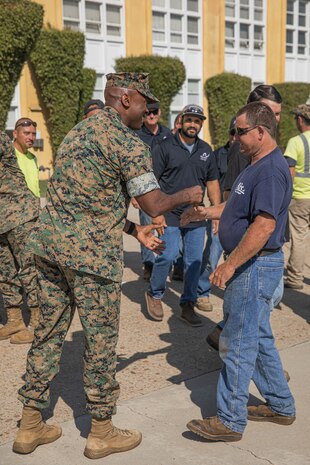 U.S. Marine Corps Brig. Gen. James A. Ryans II, commanding general, Marine Corps Recruit Depot San Diego and Western Recruiting Region, shows appreciation for civilian contractors under MCRD San Diego’s logistics section at MCRD San Diego, California, Sept. 30, 2024. Civilian contractors under MCRD San Diego’s logistics section take care of depot grounds, facilities, construction maintenance and other needs around MCRD San Diego. (U.S. Marine Corps photo by Cpl. Alexandra M. Earl)