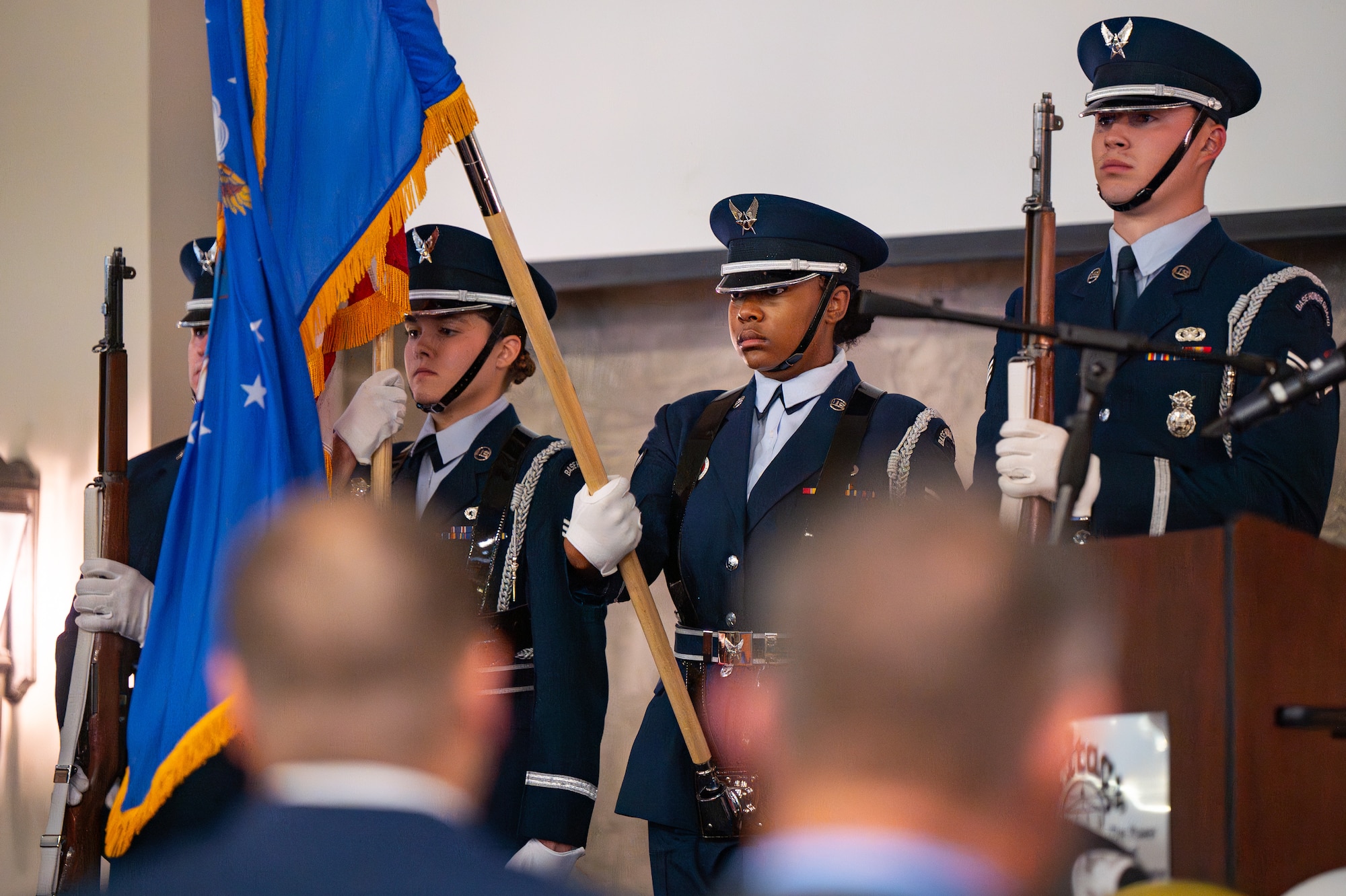 Uniformed personnel hold a celebration.