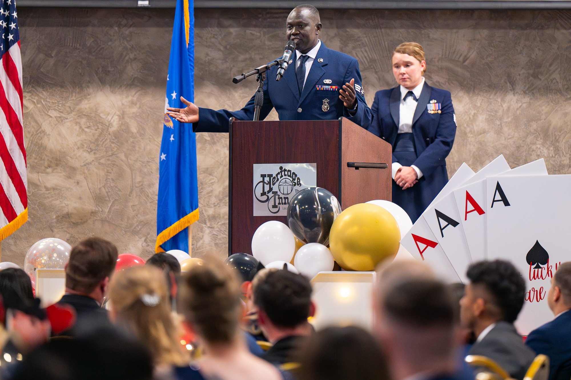 Uniformed personnel hold a celebration.