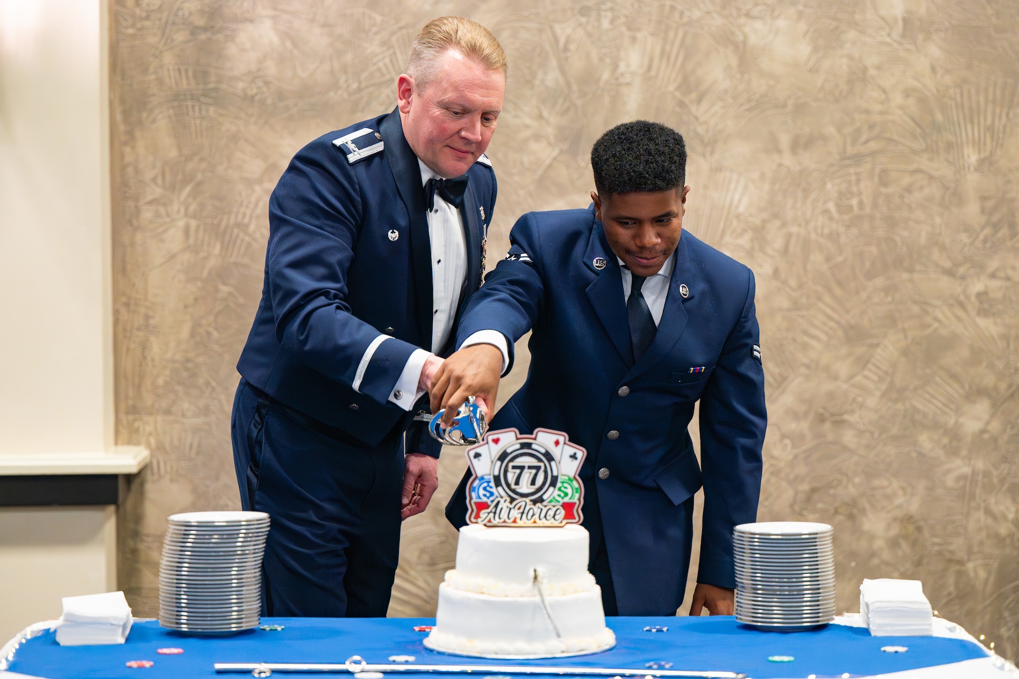 Uniformed personnel hold a celebration.