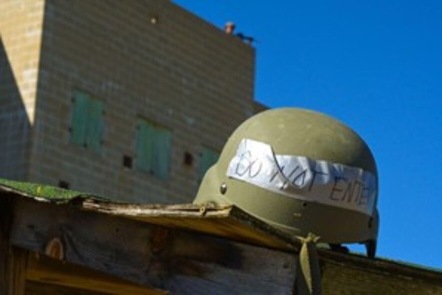 An Airman assigned to the 891st Missile Security Forces Squadron (MSFS) guards a rooftop with an M-4 carbine rifle during an exercise at Camp Ripley, Minnesota, Sept. 26, 2024. Airmen from 891 MSFS traveled to Camp Ripley to improve military readiness and team cohesion.