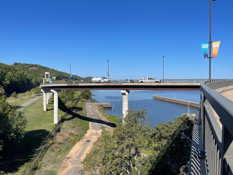 vehicles on a bridge over water