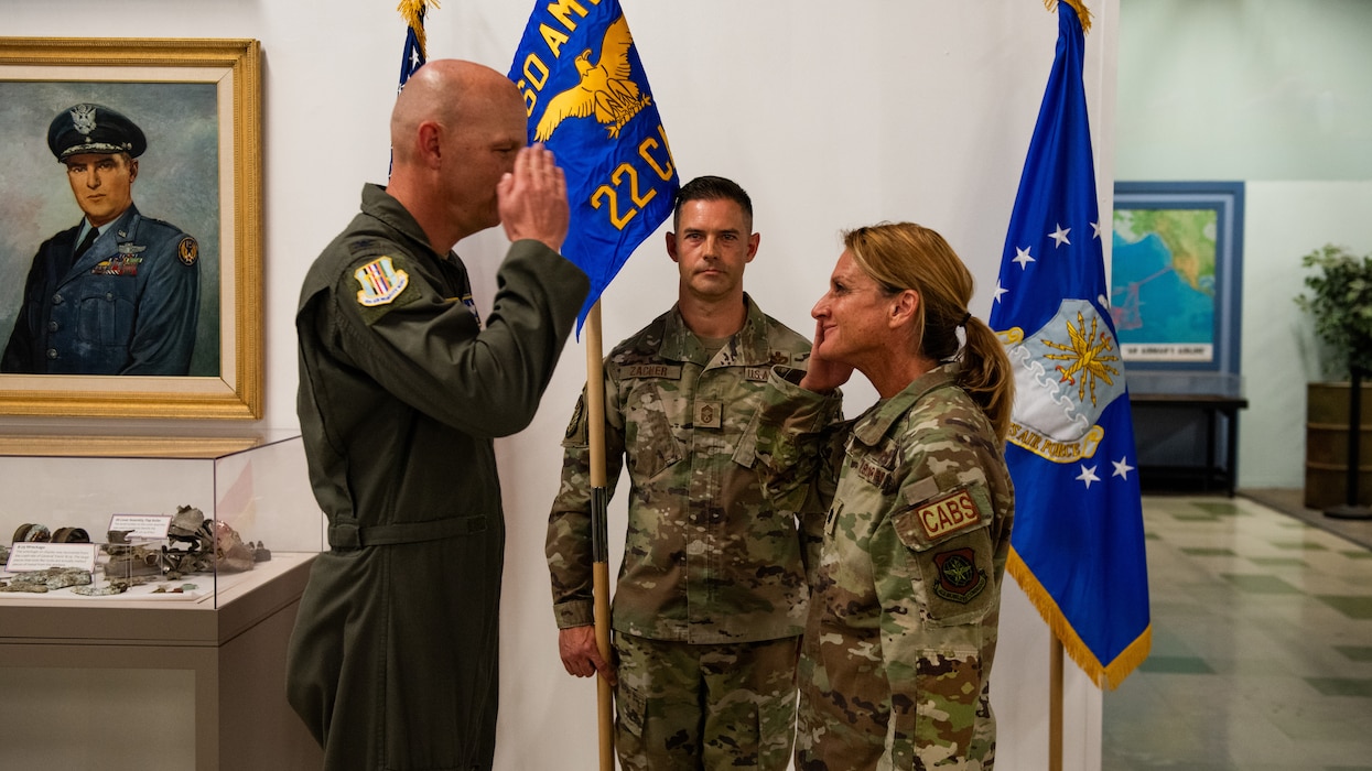 Base commander and new squadron commander salute each other