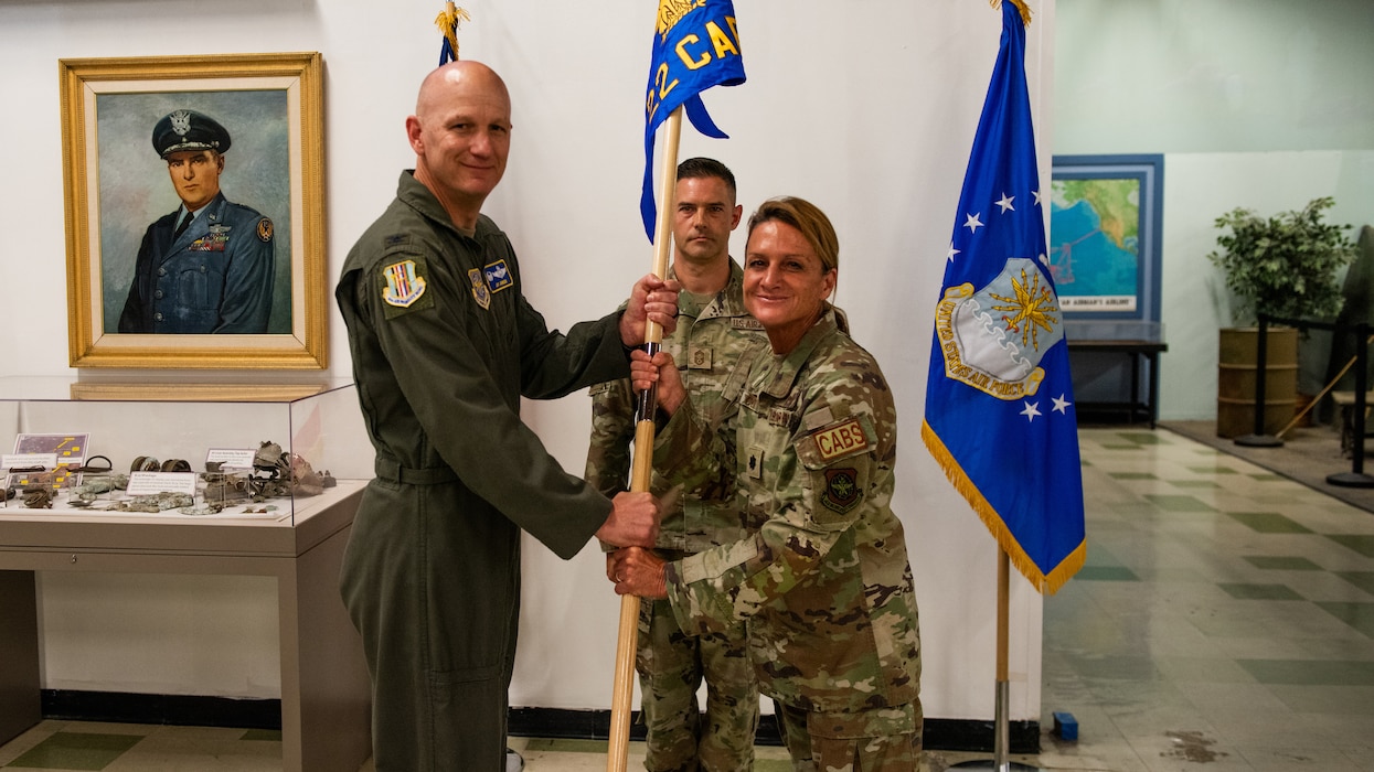 New commander receives ceremonial guidon from base commander