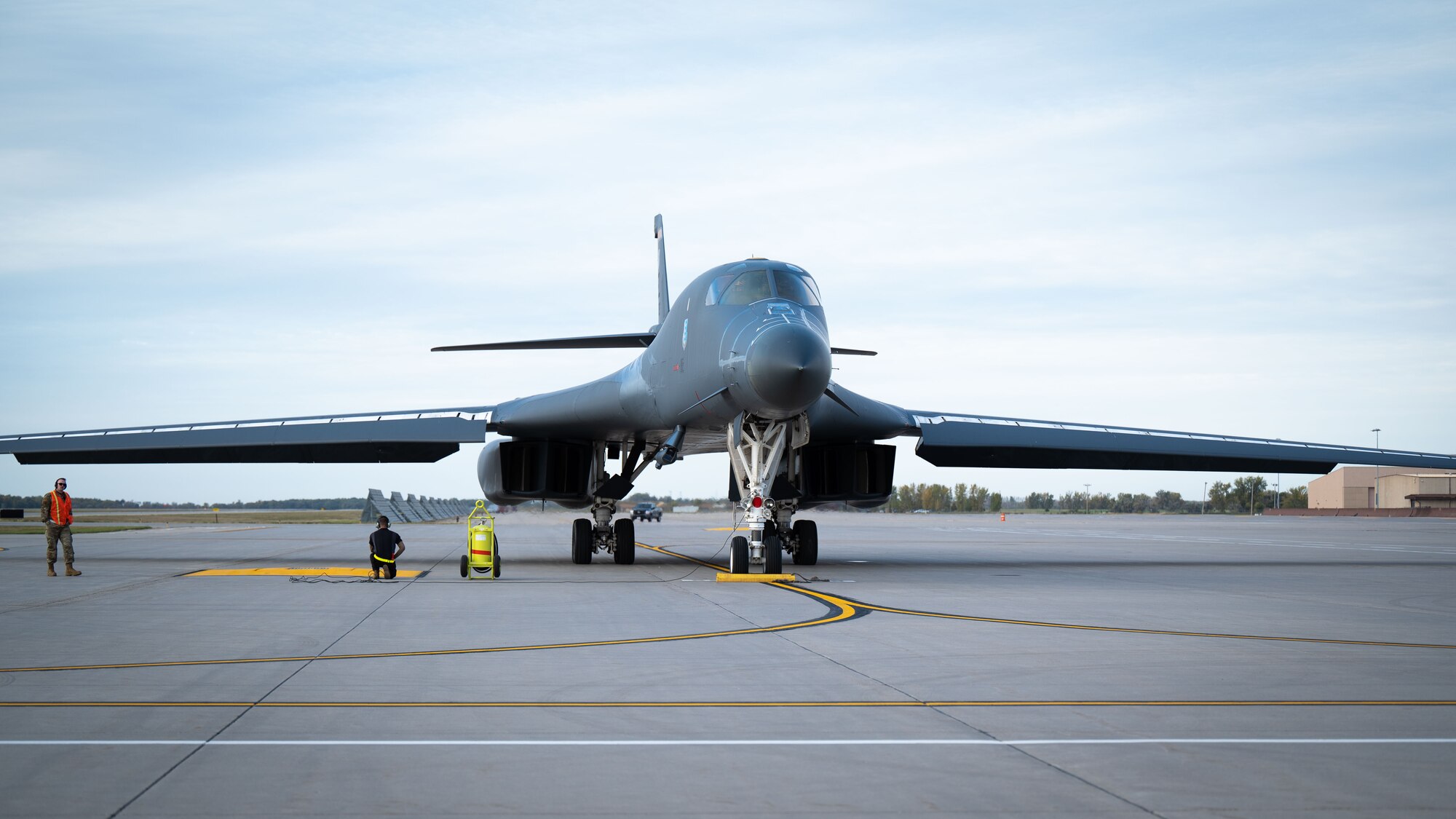 A B-1B Lancer stands on a runway.